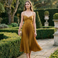Dijon Pleated Satin Midi Dress with Knot Front - Woman Wearing Elegant Evening Dress - Le Chateau