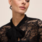Black Lace Bolero with 3/4 Sleeves and Bow Ties - Close-up Fabric Detail - Le Chateau