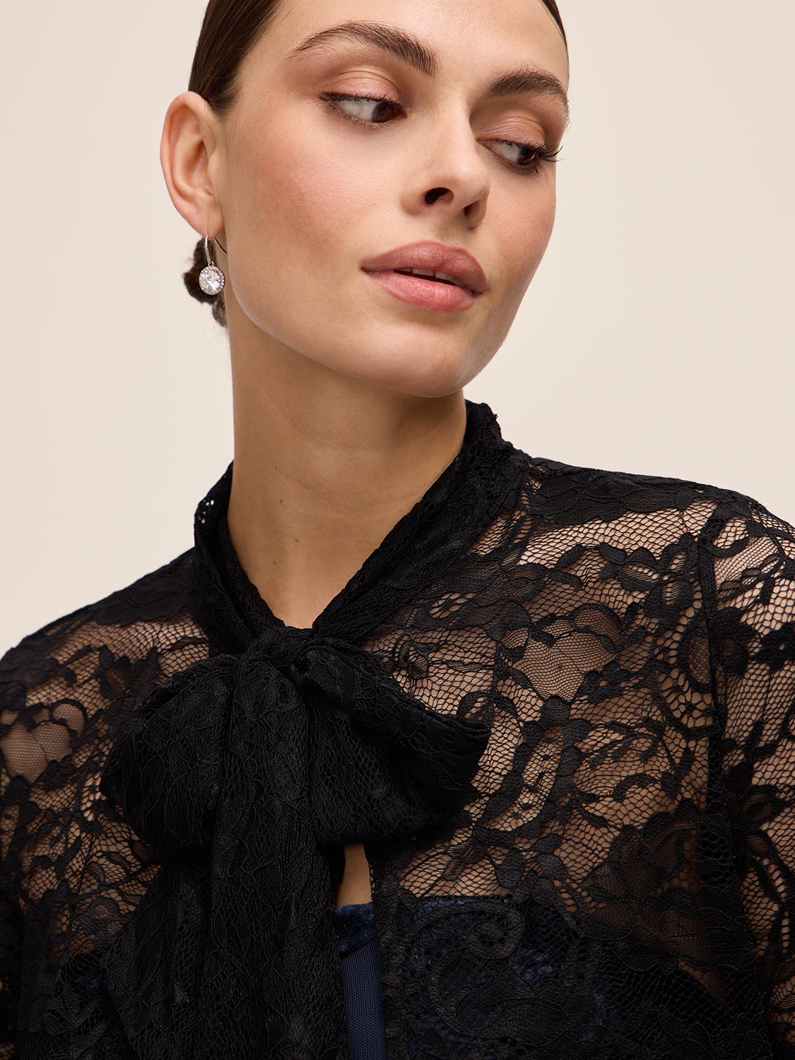 Black Lace Bolero with 3/4 Sleeves and Bow Ties - Close-up Fabric Detail - Le Chateau