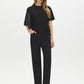 Black Wash Straight Leg Denim - Woman Wearing Mid-Rise Jeans with Wide Hem - Suzy Shier