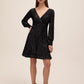 Black Sequin V-Neck Fit and Flare Mini Dress - Woman Wearing Sparkling Evening Dress with Long Cuffed Sleeves - Le Chateau