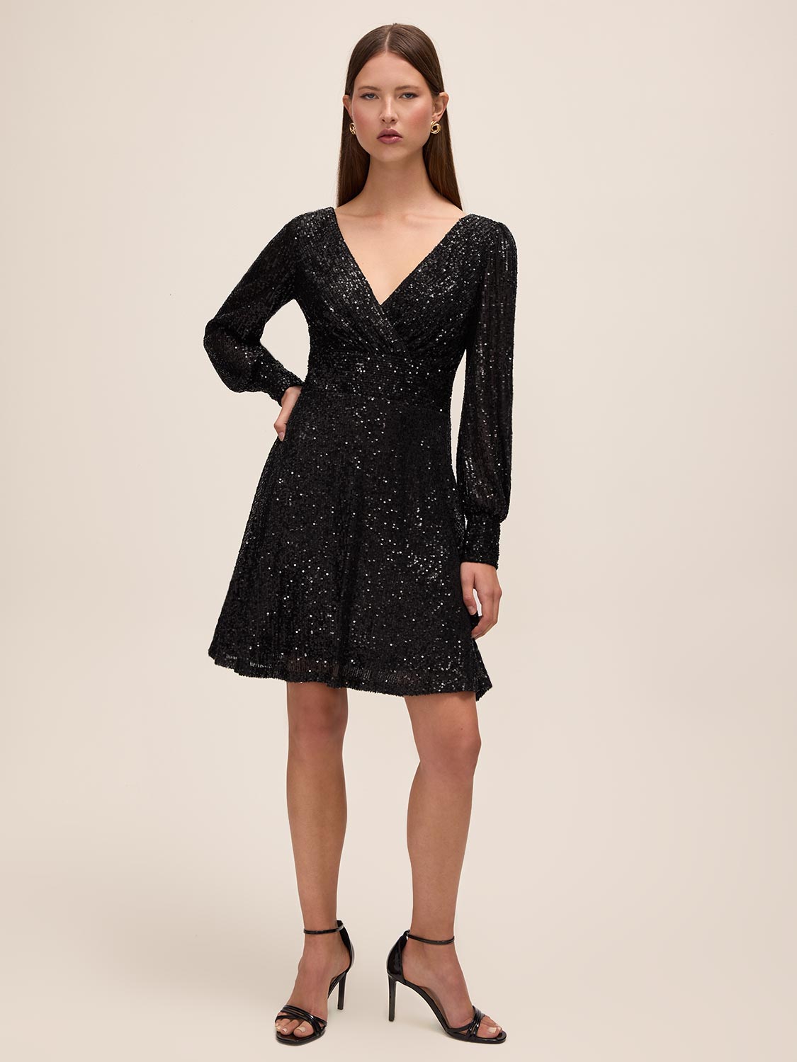 Black Sequin V-Neck Fit and Flare Mini Dress - Woman Wearing Sparkling Evening Dress with Long Cuffed Sleeves - Le Chateau