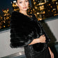 Black Fur-Striped Shawl with Jewel Trim Closure - Woman Wearing Elegant Evening Cover-Up - Le Chateau