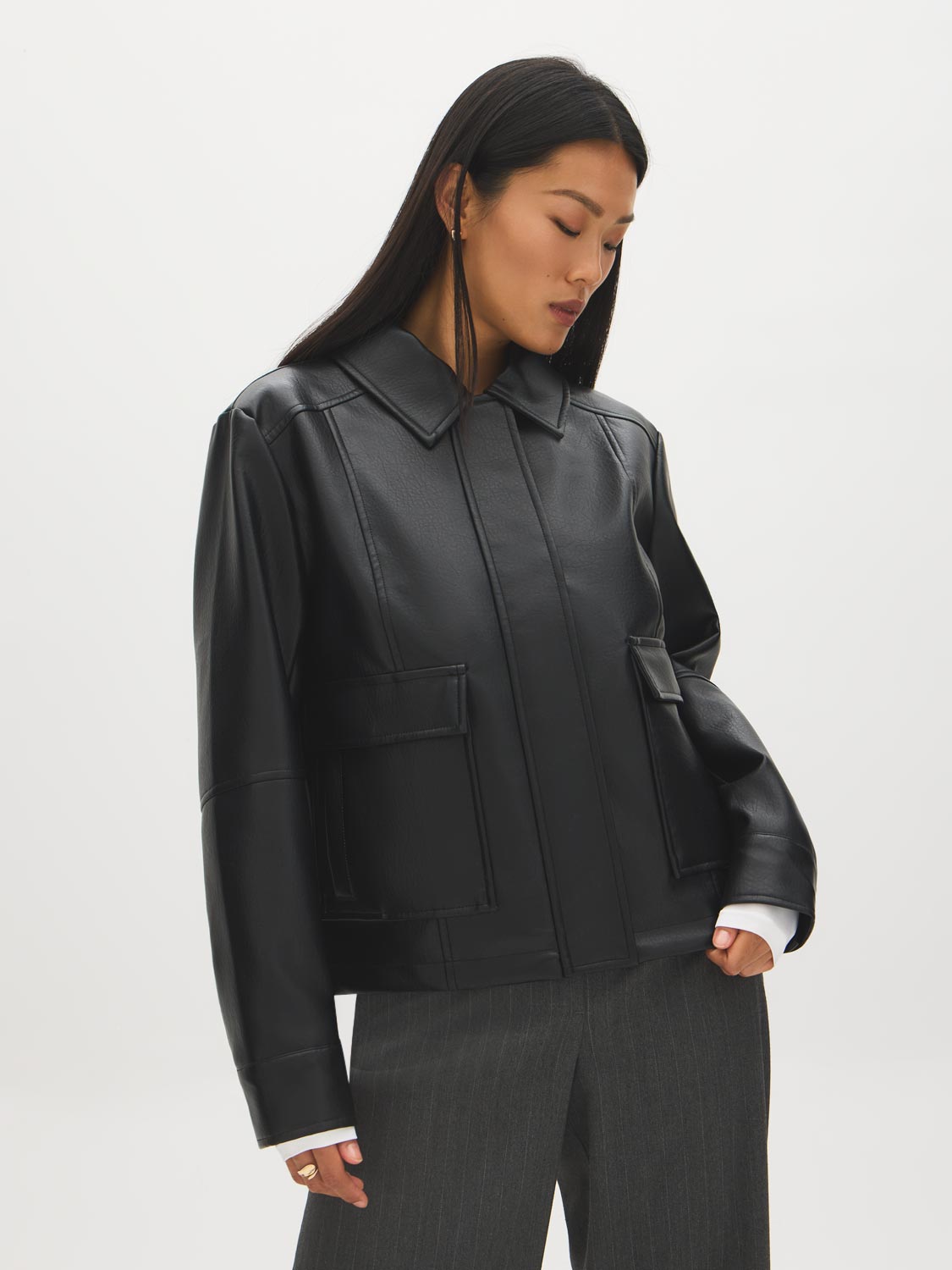 Black Oversized Faux Leather Utility Jacket - Side Profile View - Suzy Shier