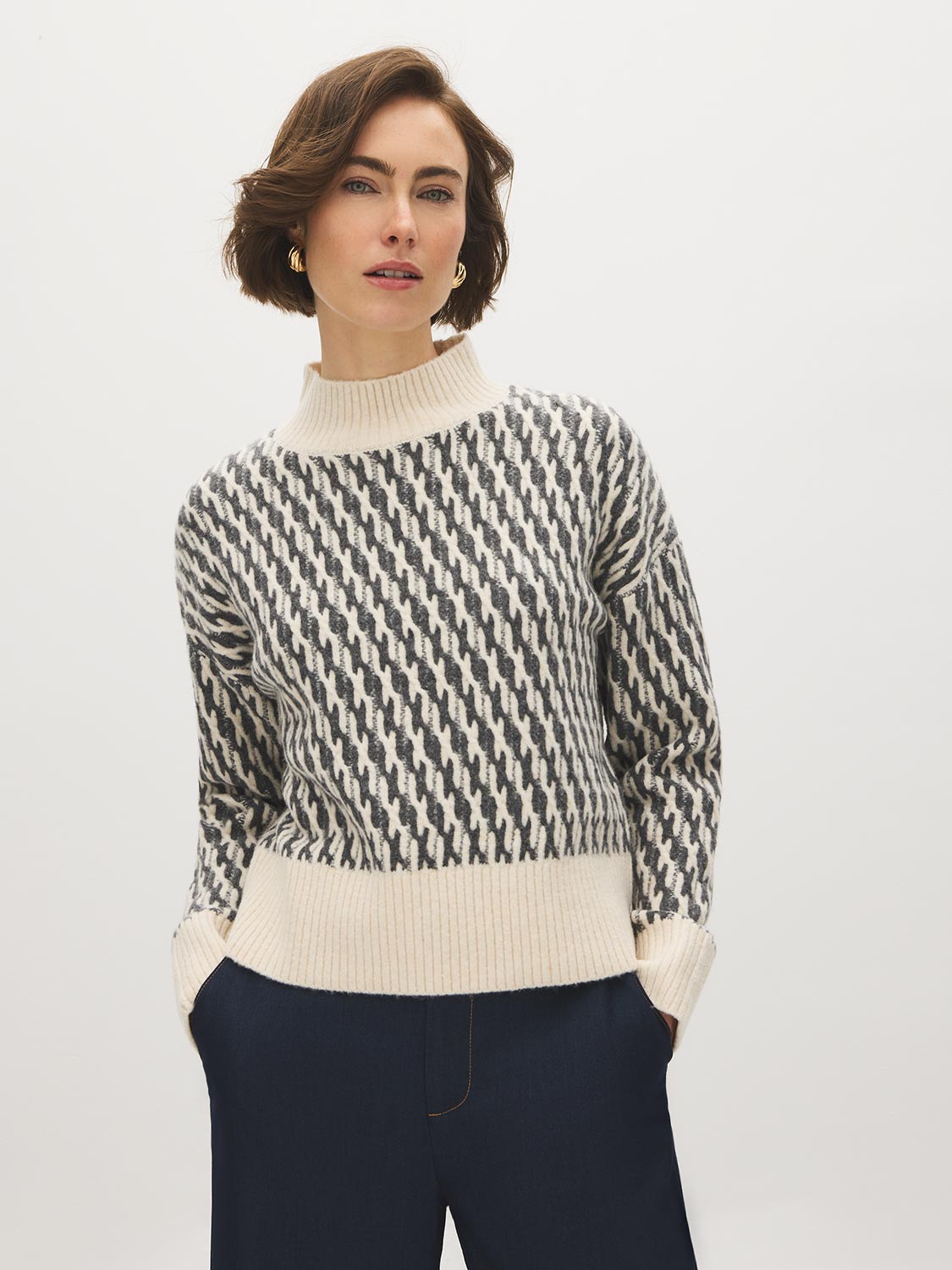 White/Dark Grey Jacquard Mock Neck Sweater - Woman Wearing Patterned Knit Sweater - Suzy Shier