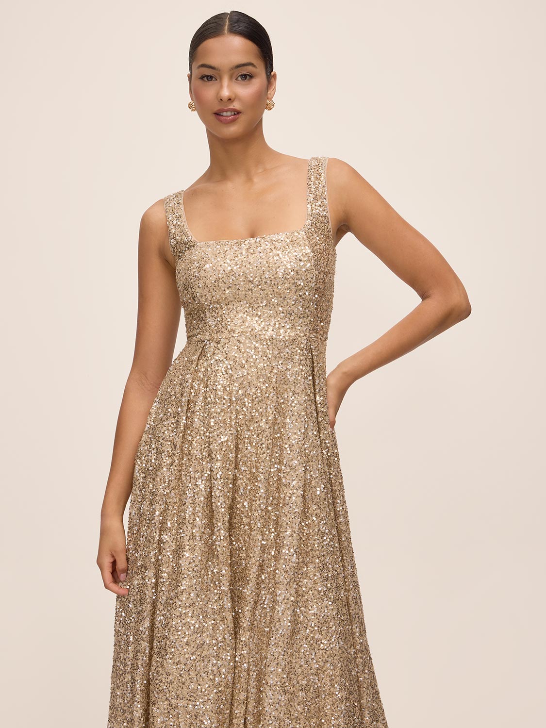 Gold Sequin Fit & Flare Midi Dress with Pleating - Front View - Le Chateau