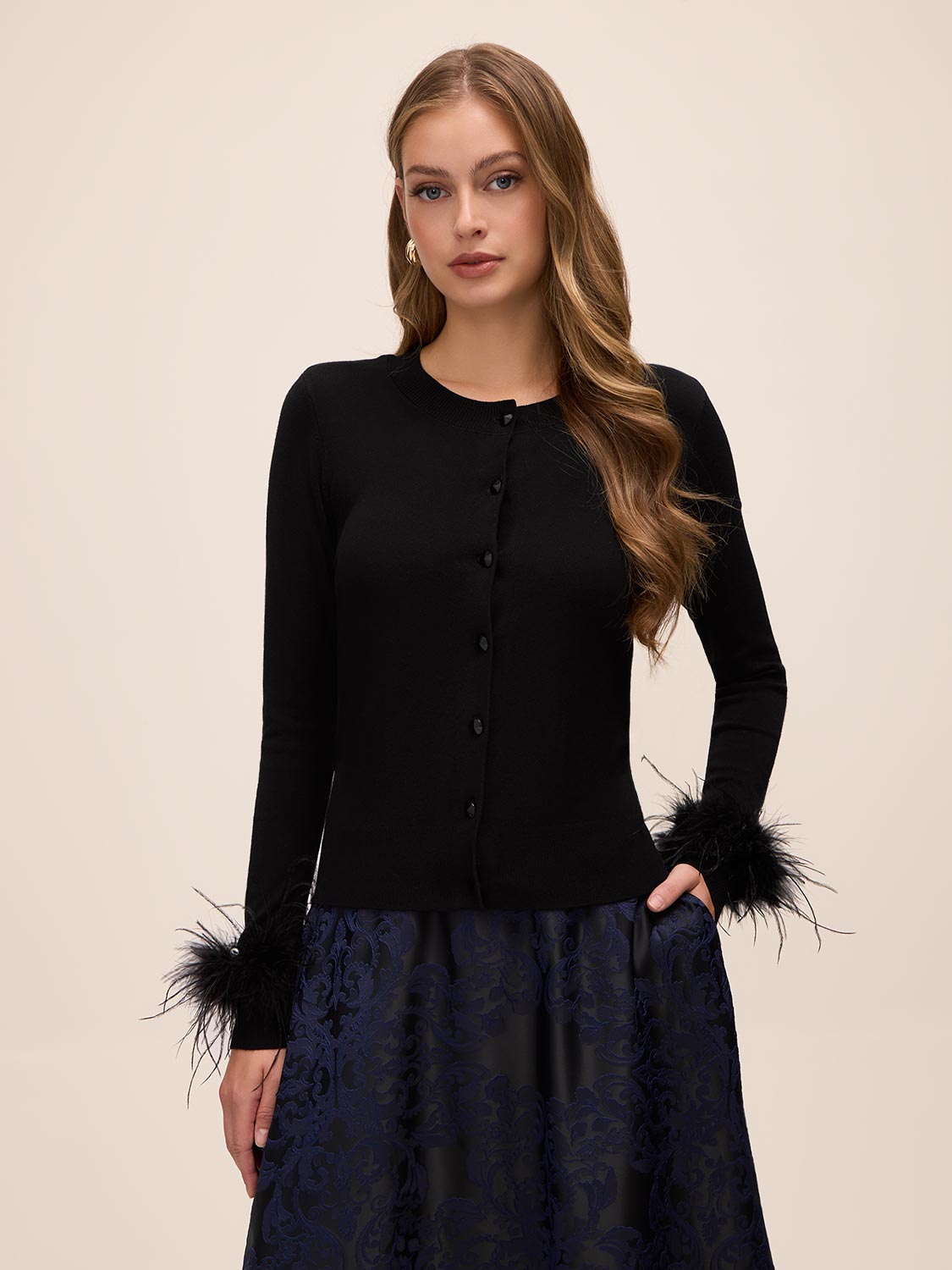 Black Feather Cuff Cardigan - Woman Wearing Knit Sweater with Feather Detail - Le Chateau