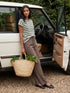 Snow White and Green Striped Dolman Sleeve Knit Top - Woman Wearing Casual Stripe Top - Suzy Shier