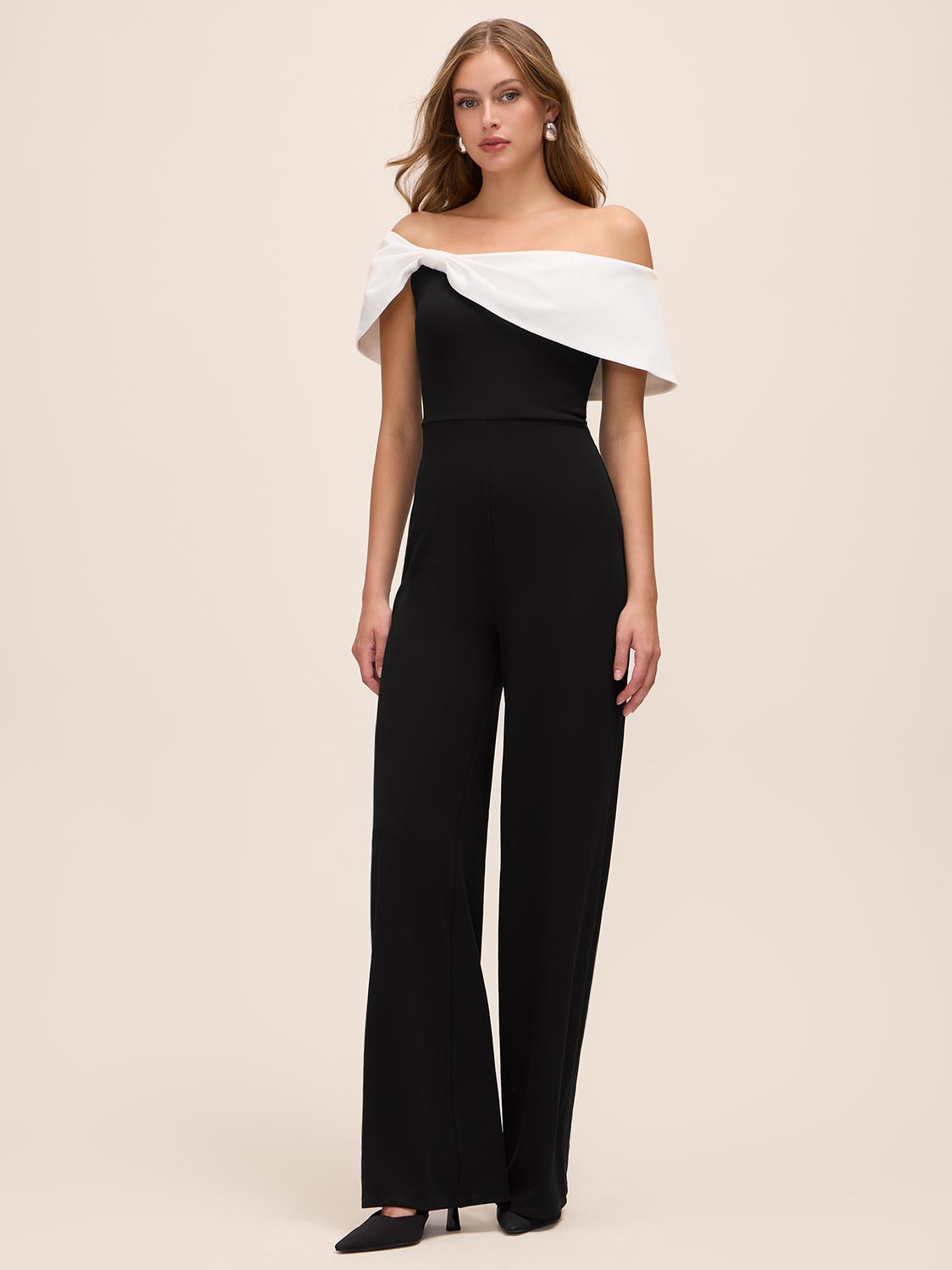 Black/White Asymmetrical Off-Shoulder Knit Jumpsuit - Front View - Le Chateau