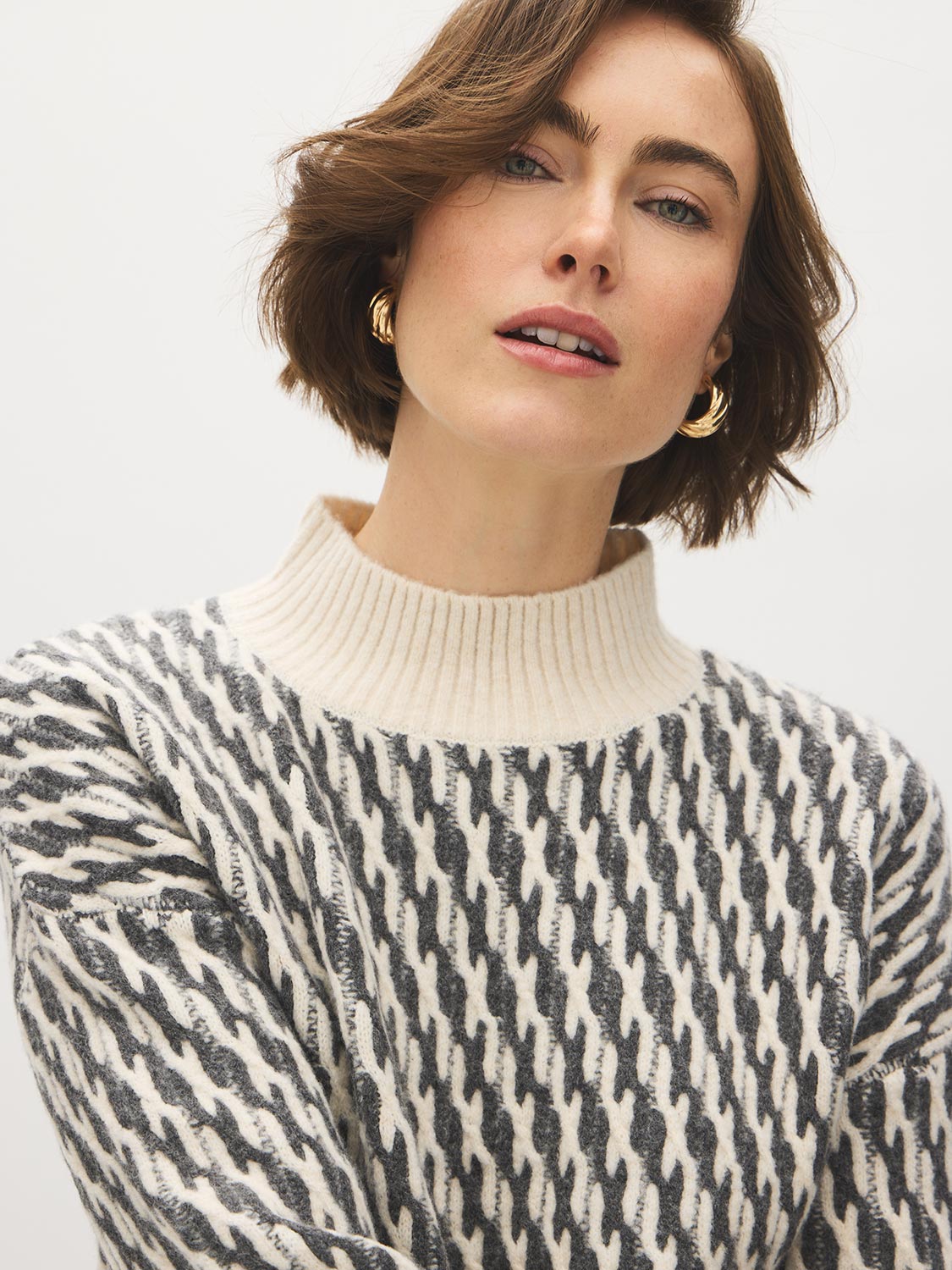White/Dark Grey Jacquard Mock Neck Sweater - Close-up Fabric Detail - Suzy Shier