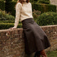 Coffee Bean Faux Leather A-Line Skirt with Yoke - Woman Wearing Structured Skirt - Suzy Shier
