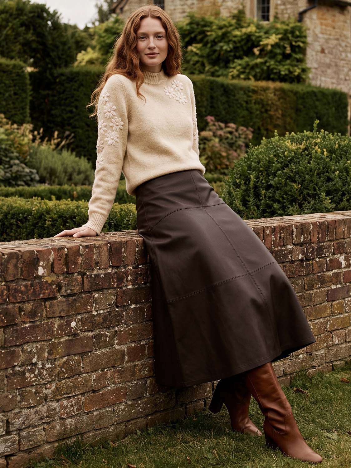 Coffee Bean Faux Leather A-Line Skirt with Yoke - Woman Wearing Structured Skirt - Suzy Shier