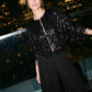 Black Sequin Fringe Bolero Cover Up - Woman Wearing Long Sleeve Mesh Top - Le Chateau