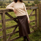 Beige Floral Embroidered Mock Neck Sweater - Close-up Fabric Detail - Suzy Shier