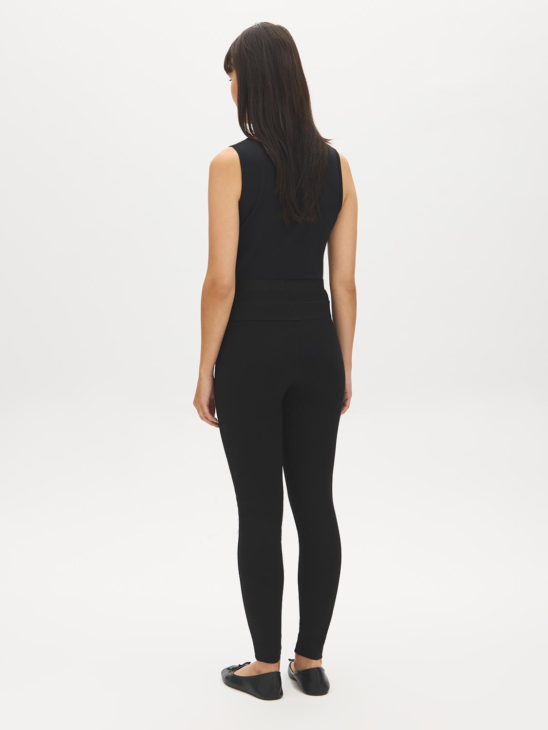 Black High-Rise Skinny Knit Pants - Back View - Suzy Shier