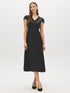 Black/White Dot Satin Midi Dress with Lace Trim - Woman Wearing Elegant Polka Dot Dress - Suzy Shier
