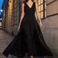 Black V-Neck Jumpsuit with Jacquard Skirt Overlay - Woman Wearing Elegant Eveningwear - Le Chateau
