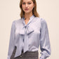 Steel Blue Floral Damask Tie Neck Bow Blouse - Woman Wearing Elegant Woven Top - Le Chateau