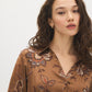 Soft Silt Paisley Print Satin-Like Blouse - Close-up Fabric Detail - Suzy Shier