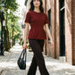 Syrah Button Front Peplum Crepe Top - Woman Wearing Short Sleeve Knit Top - Suzy Shier