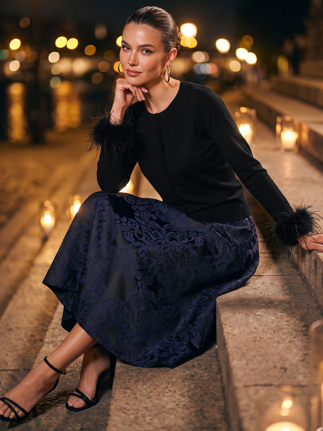 Black Feather Cuff Cardigan - Woman Wearing Knit Sweater with Feather Detail - Le Chateau