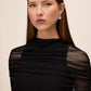 Black Knit Crepe Sheath Dress with Mesh Cape Overlay - Close-up Fabric Detail - Le Chateau