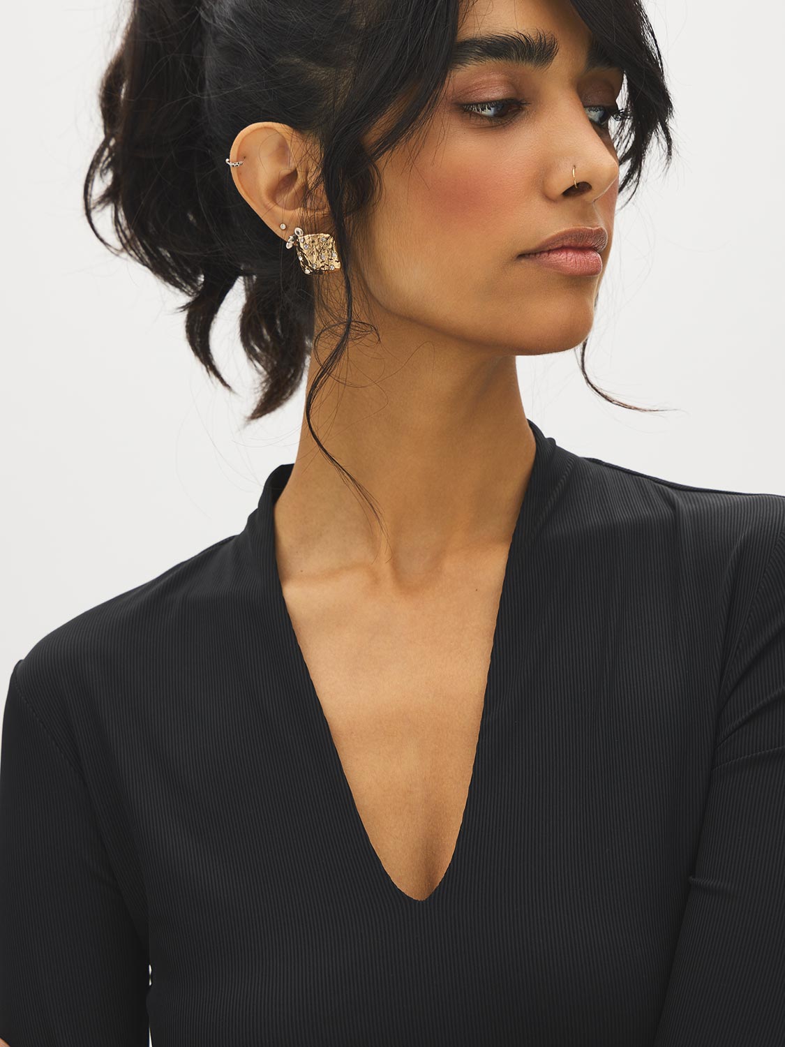 Jet Black Deep V-Neck Ribbed Knit Top - Close-up Fabric Detail - Suzy Shier