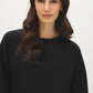 Coffee Bean Cloud Fleece Top with Drop Shoulder Sleeves - Close-up Fabric Detail - Suzy Shier