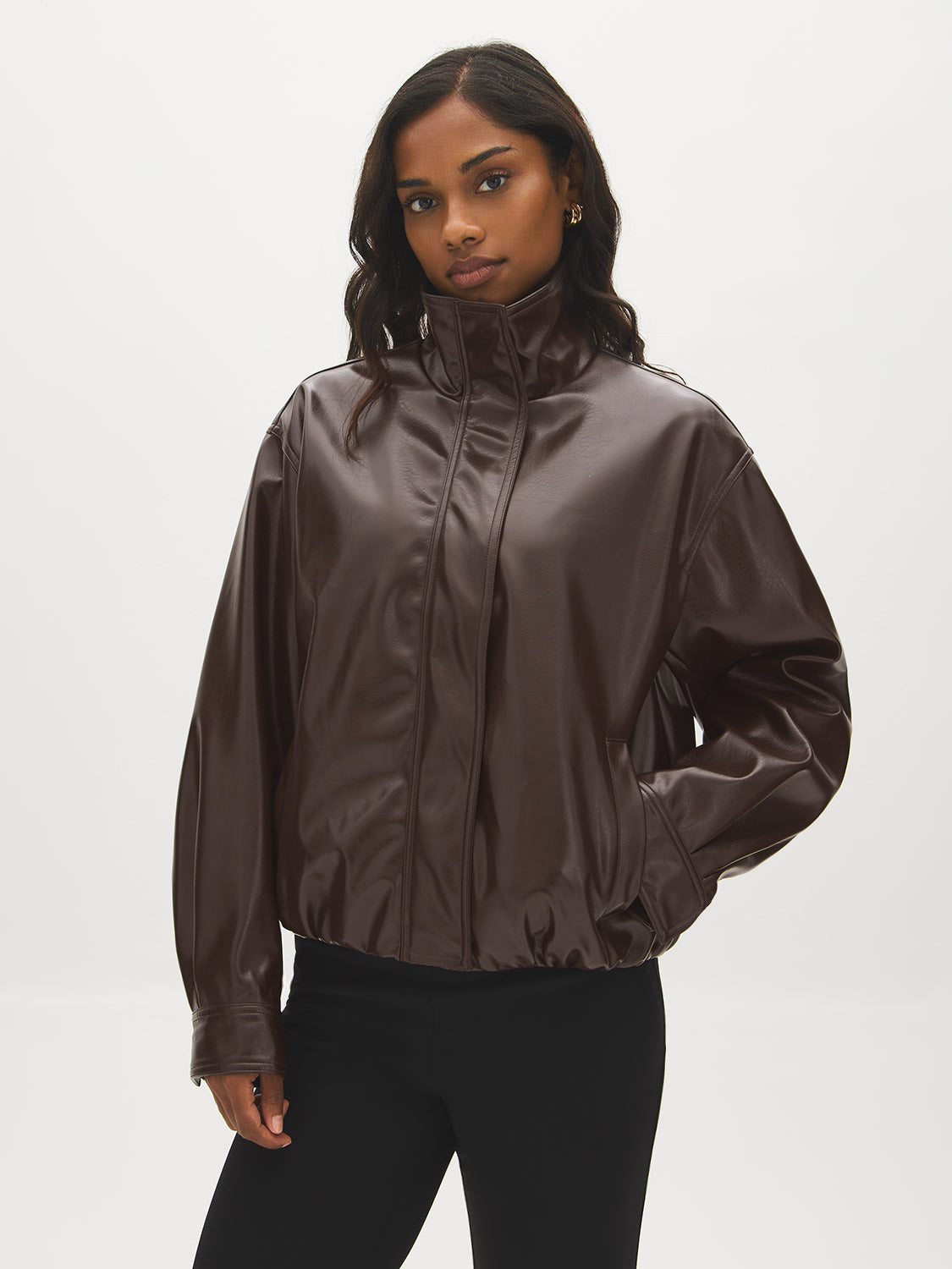 Brown Vegan Leather Bomber Jacket with Funnel Neck - Woman Wearing Vegan Leather Outerwear - Suzy Shier