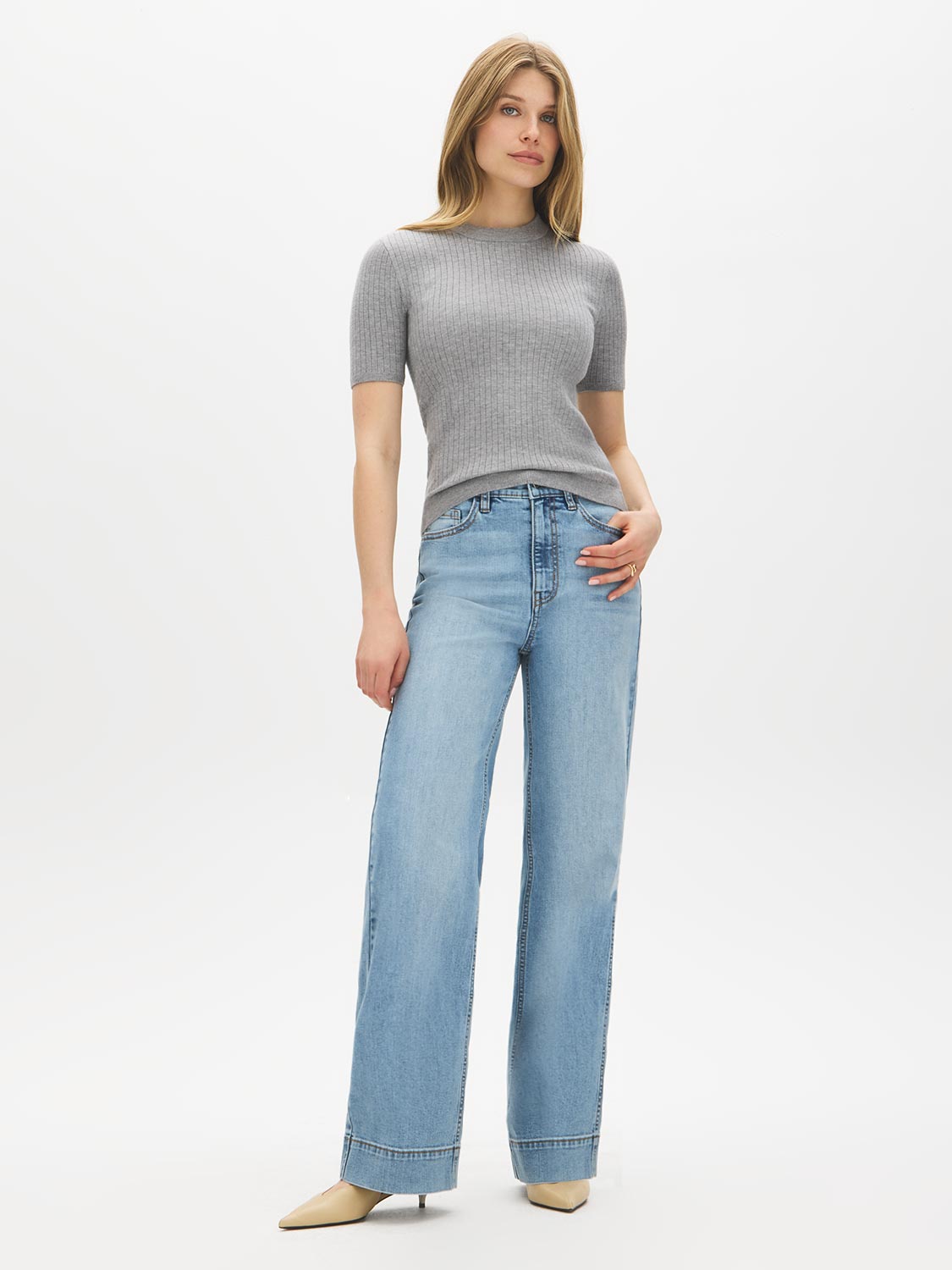 Medium Stone Wash Straight Leg Denim with Wide Hem - Woman Wearing Midrise Denim Pants - Suzy Shier