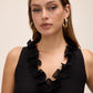 Black Plissé Ruffle Sleeveless Blouse - Close-up Ruffle Detail - Le Chateau