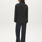 Black Textured Faux Leather Jacket with Patch Pockets - Back View - Suzy Shier