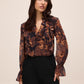 Black/Toffee Paisley Ruffle Blouse - Woman Wearing Flowing Patterned Top - Le Chateau