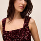 Burgundy Sequin Square Neck Sheath Dress - Close-up Fabric Detail - Le Chateau