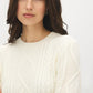 Rice Cable Knit Sweater with Side Slits - Close-up Fabric Detail - Suzy Shier