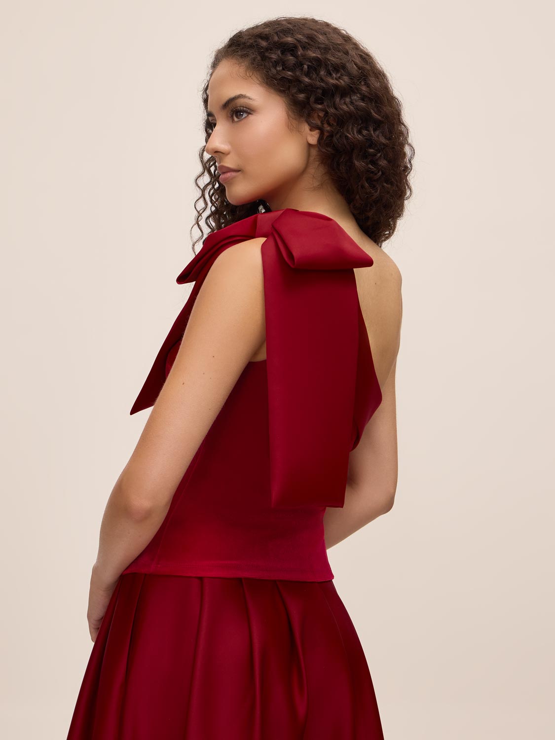 Lipstick Red Satin Bow One-Shoulder Velour Top - Side Profile View - Le Chateau