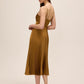 Dijon Pleated Satin Midi Dress with Knot Front - Side Profile View - Le Chateau