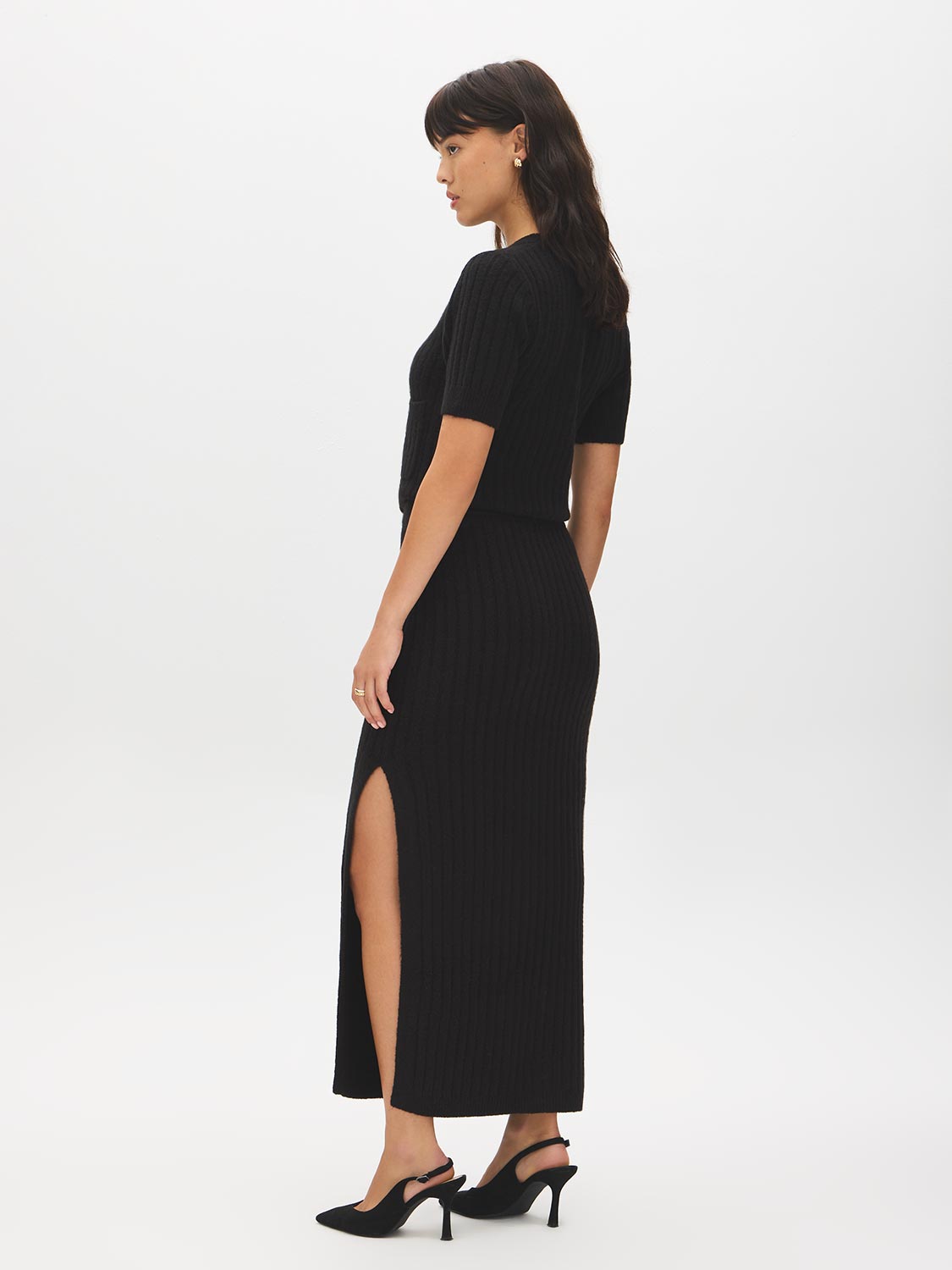 Bruised Burgundy Melange Ribbed Knit Sweater Skirt with Side Slit - Side Profile View - Suzy Shier