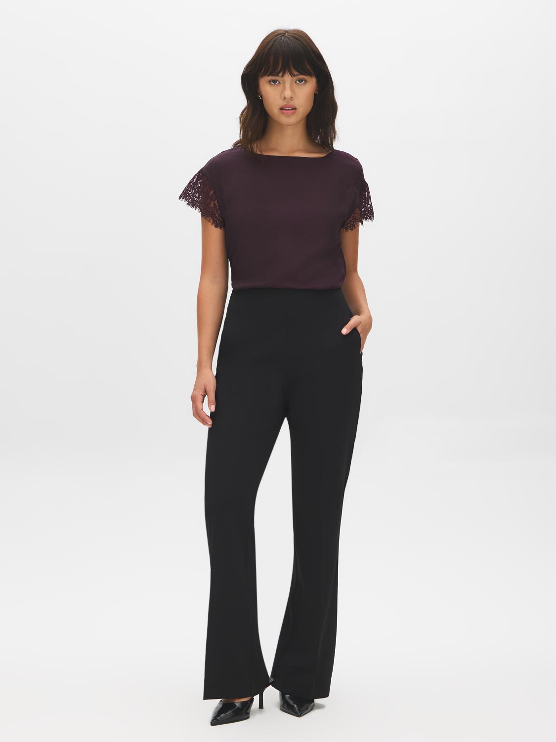 Black Seam Front Flare Leg Pants - Woman Wearing Flared Knit Trousers - Suzy Shier