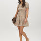 Sterling Blue Ditsy Print Off-Shoulder Mini Dress - Woman Wearing Tiered Skirt Dress - Suzy Shier