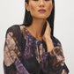 Prune Floral Mesh Bubble Top with Balloon Sleeves - Close-up Fabric Detail - Suzy Shier