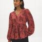 Apple Butter Printed Crinkle Satin Peplum Blouse - Woman Wearing V-Neck Floral Blouse - Suzy Shier