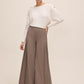 Off White Dolman Sleeve Sweater with Gold Buttons - Side Profile View - Le Chateau