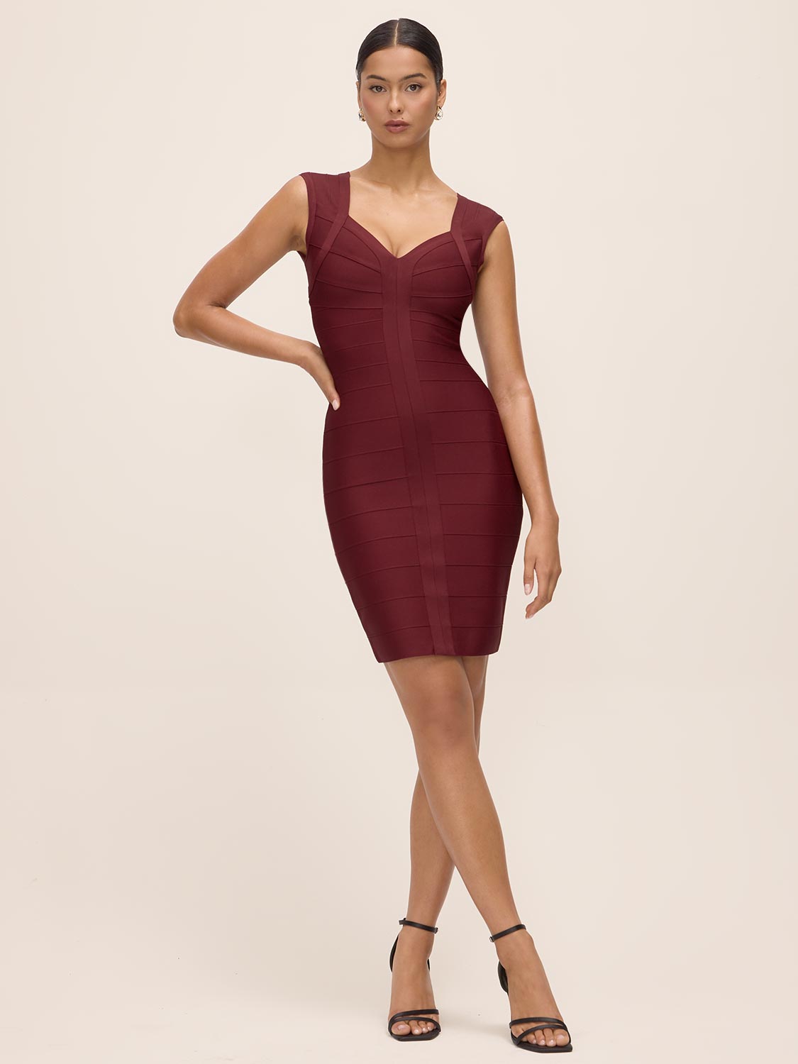 Burgundy V-Neck Bandage Sheath Dress - Woman Wearing Sleeveless Fitted Dress - Le Chateau