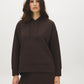 Dk Brown Ottoman Rib Hoodie with Kangaroo Pocket - Woman Wearing Cozy Knit Top - Suzy Shier