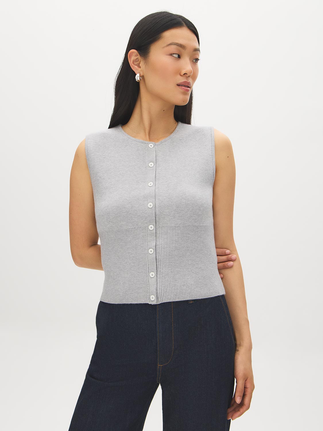 Lunar Melange Sleeveless Knit Sweater with Faux Button Placket - Woman Wearing Classic Rib Stitch Top - Suzy Shier