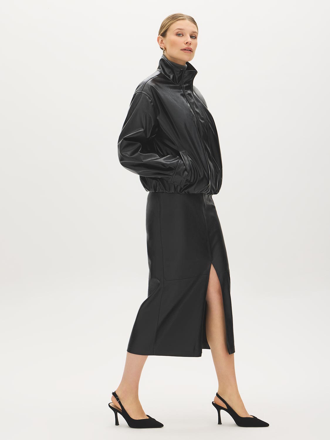 Black Textured Faux Leather Midi Skirt - Woman Wearing Column Skirt with Front Slit - Suzy Shier