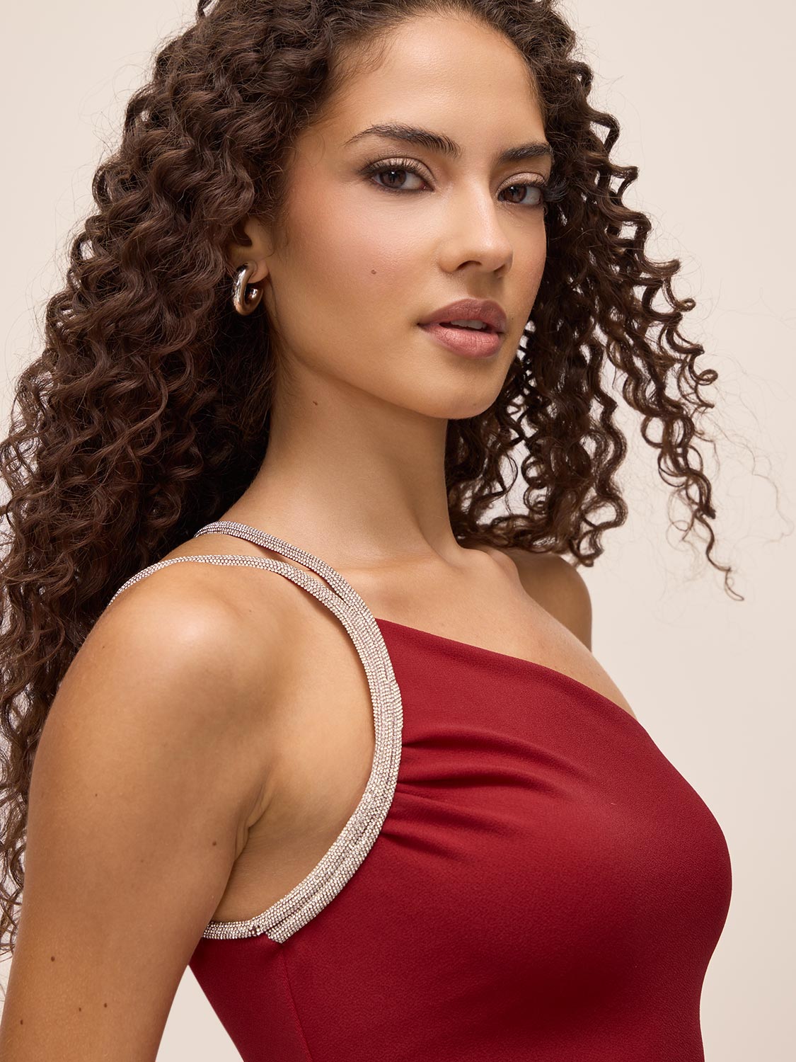 Red One-Shoulder Midi Dress with Rhinestone Trim - Close-up Shoulder Detail - Le Chateau
