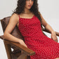 Jester Red Polka Dot Chiffon Mini Dress - Woman Wearing V-Neck Mini Dress with Adjustable Straps - Suzy Shier