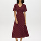 Zinfandel Polka Dot Flowy Shirt Dress - Woman Wearing V-Neck Button Front Dress - Suzy Shier